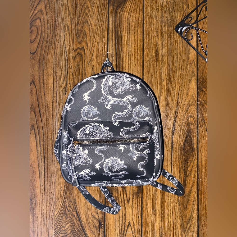 Small dragon black backpack